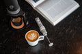 OutIn LattoGo in Starburst Silver with a latte